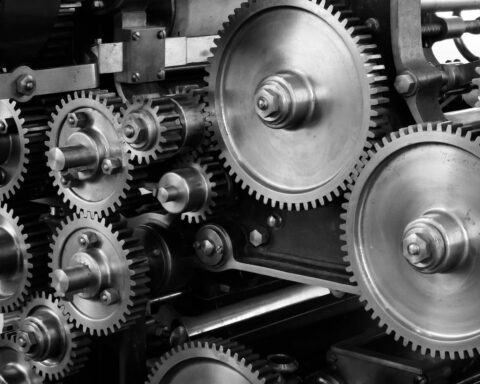 gray scale photo of gears