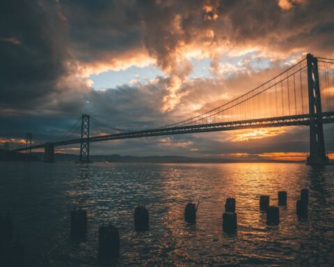 silhouette of golden gate bridge during golden hour