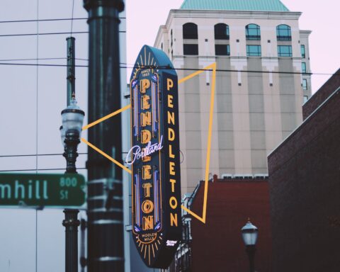 photography of black and yellow signage