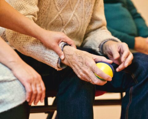 person holding a stress ball