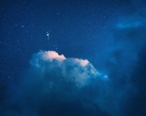 blue and white sky with stars