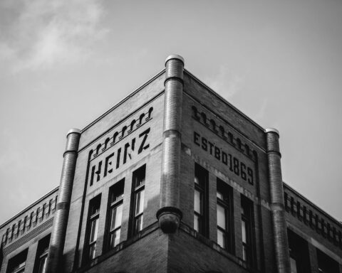 grayscale photo of a concrete building