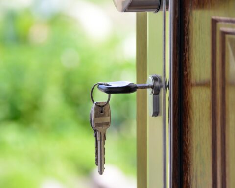 black handled key on key hole