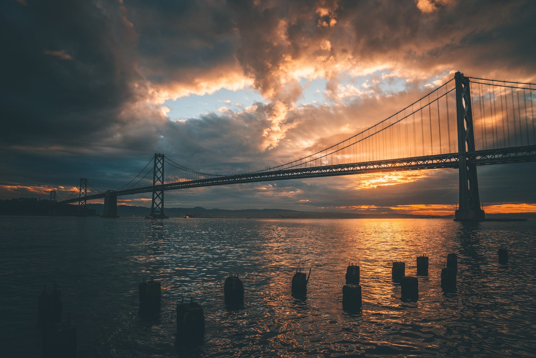 silhouette of golden gate bridge during golden hour