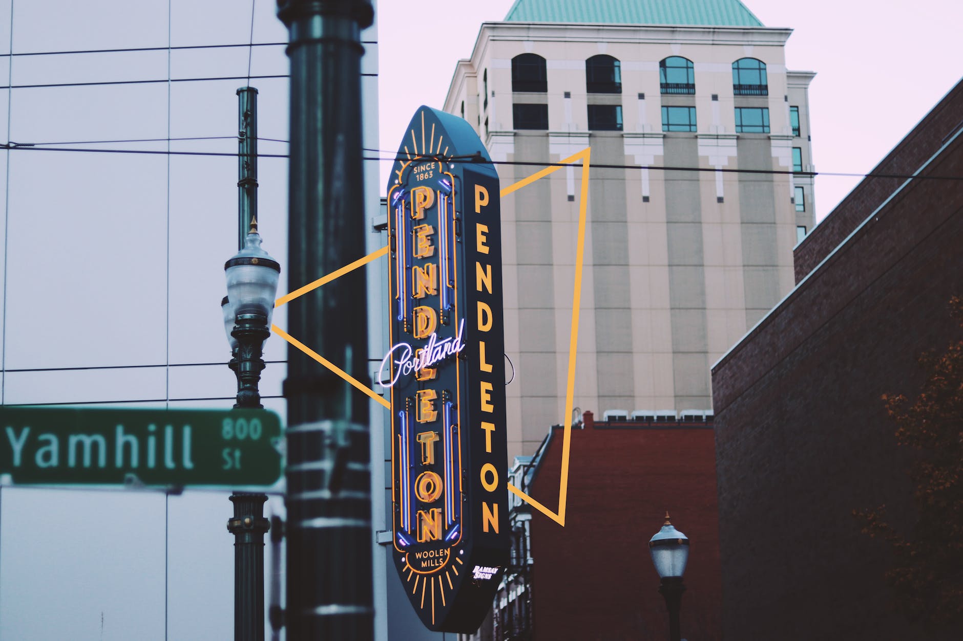 photography of black and yellow signage