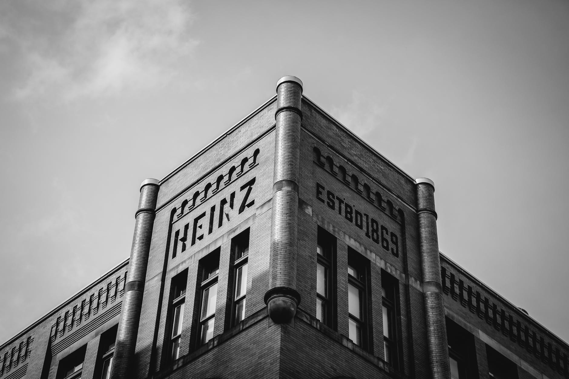 grayscale photo of a concrete building