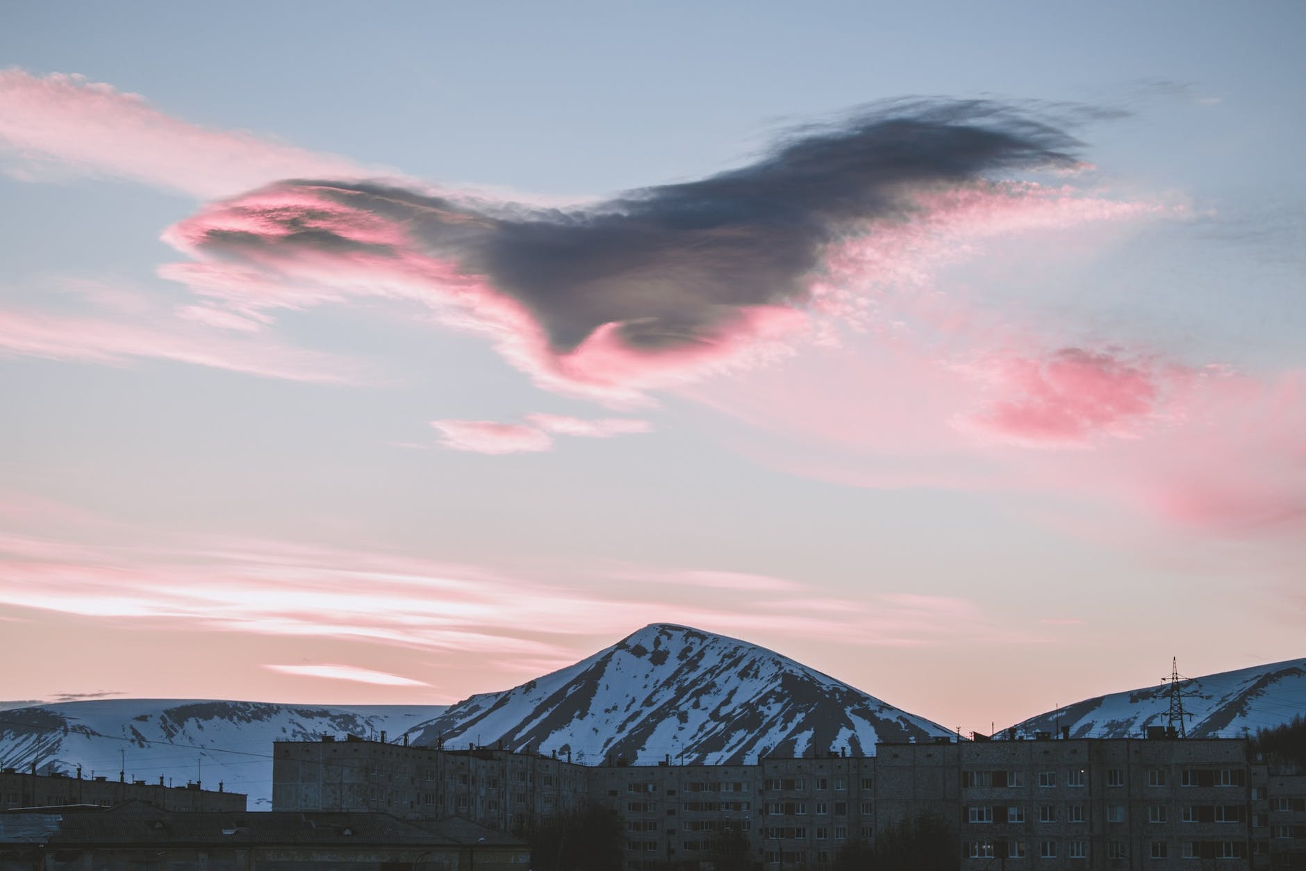 snow capped mountains during golden hour