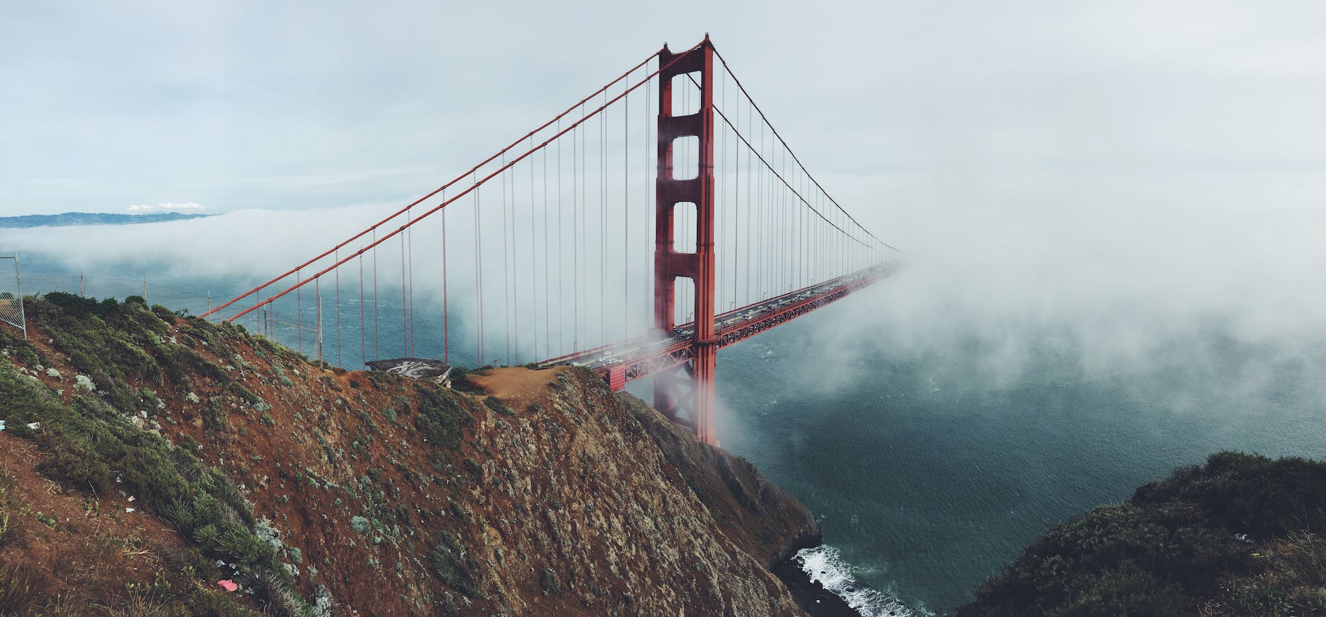 landscape photography of red cable bridge