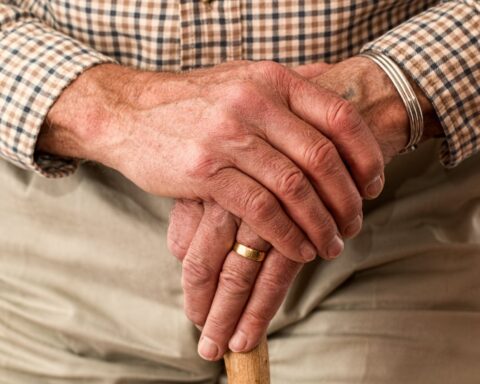 man hands waiting senior