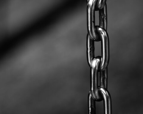 grayscale photography of chain