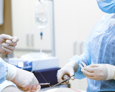 photo of medical professionals wearing personal protective equipment