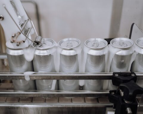 cans of beer in the production line