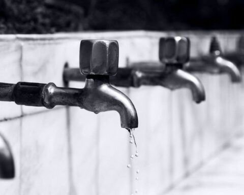 water drops from faucet